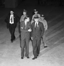 Charles Lindberg touring an aviation factory in WWII