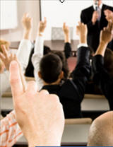 picture of hand raising in classroom